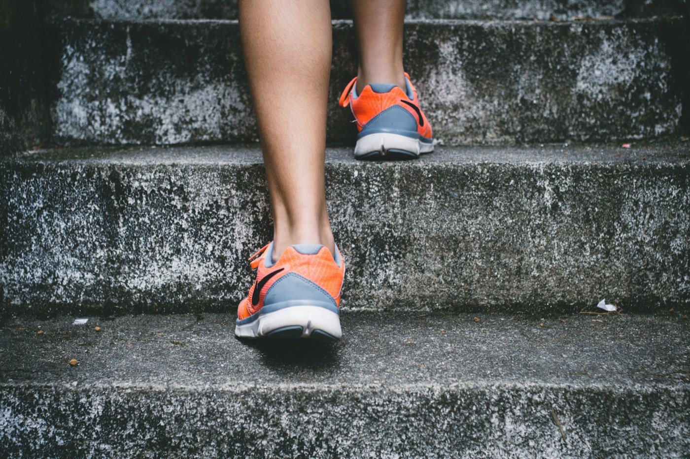 Running up stone steps in the early morning